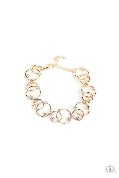 THE UNIVERSE REVOLVES AROUND ME - GOLD CIRCLE WHITE RHINESTONE BRACELET - PAPARAZZI