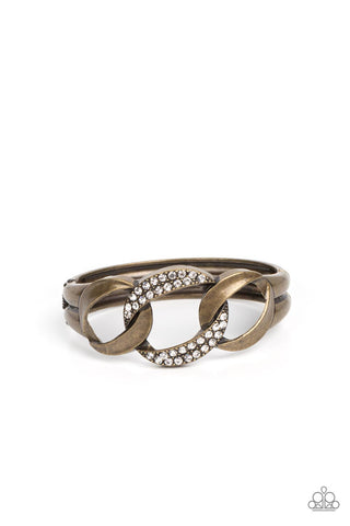 BOMBSHELL SQUAD - BRASS LINK WHITE RHINESTONE HINGED BRACELET - PAPARAZZI