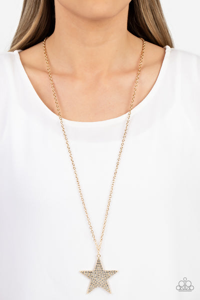 ROCK STAR SPARKLE - GOLD STAR RHINESTONE PENDANT LONG NECKLACE - PAPARAZZI Regular price