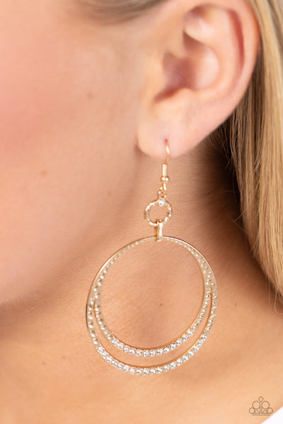 SPIN YOUR HEELS - GOLD OVAL WHITE RHINESTONE EARRINGS - PAPARAZZI Regular price