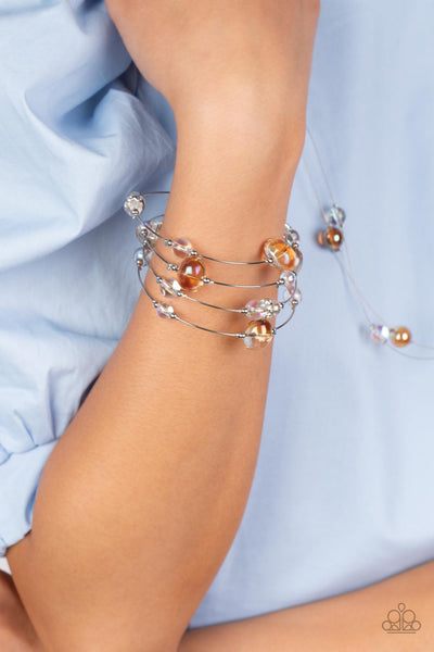 OPTICAL AURAS - MULTI ORANGE AND IRIDESCENT BEAD SILVER WIRE COIL BRACELET - PAPARAZZI