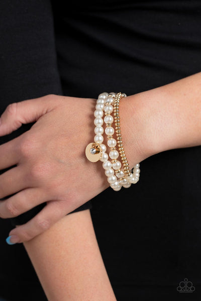 PEARLY PROFESSIONAL - GOLD BEAD WHITE PEARL AND CRYSTAL STRETCHY BRACELET - PAPARAZZI