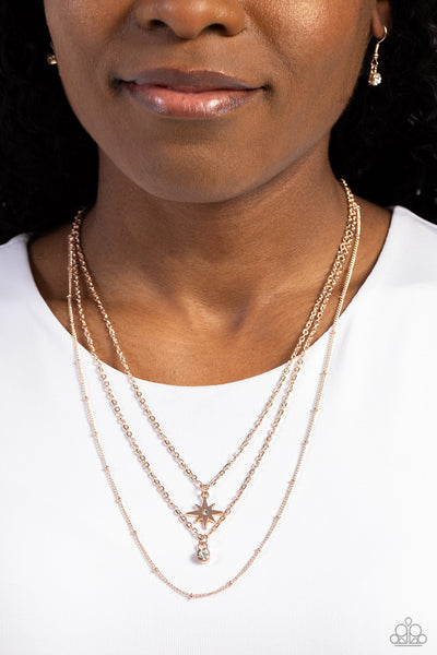 TRENDY TWINKLE - ROSE GOLD STAR LAYERED SHORT NECKLACE - PAPARAZZI