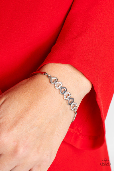 ATTENTIVE ADMIRER - WHITE RHINESTONE SILVER HEART BRACELET - PAPARAZZI