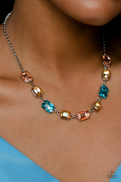 EMERALD ENVY - MULTI ORANGE BLUE AND YELLOW GEM SILVER NECKLACE - PAPARAZZI LIFE OF THE PARTY FEBRUARY 2023