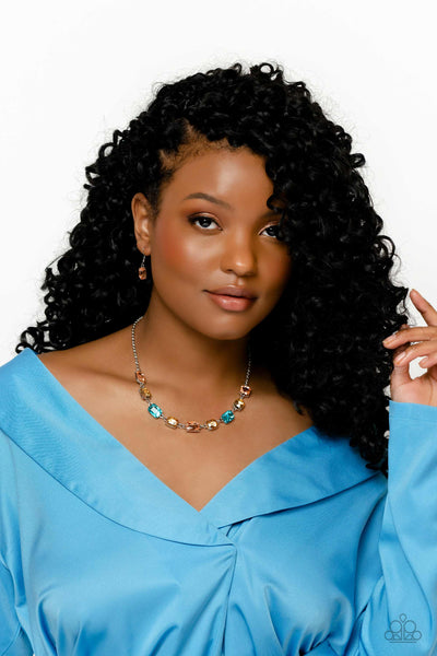 EMERALD ENVY - MULTI ORANGE BLUE AND YELLOW GEM SILVER NECKLACE - PAPARAZZI LIFE OF THE PARTY FEBRUARY 2023