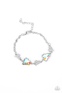 CLUELESSLY CRUSHING - MULTI IRIDESCENT AND WHITE RHINESTONE HEART SILVER BRACELET - PAPARAZZI