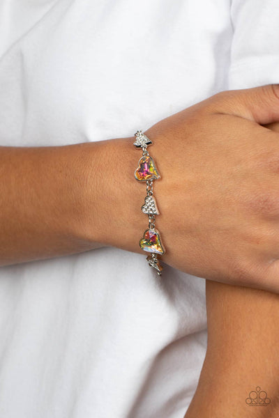 CLUELESSLY CRUSHING - MULTI IRIDESCENT AND WHITE RHINESTONE HEART SILVER BRACELET - PAPARAZZI
