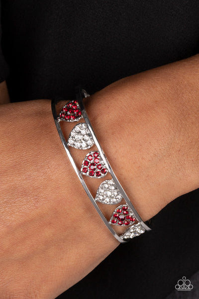 DECADENT DEVOTION - RED AND WHITE RHINESTONE HEART SILVER CUFF BRACELET - PAPARAZZI