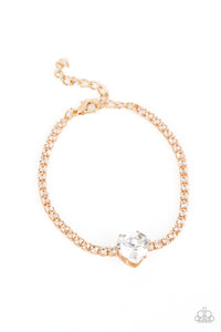 BEDAZZLED BEAUTY - GOLD HEART GEM RHINESTONE BRACELET - PAPARAZZI