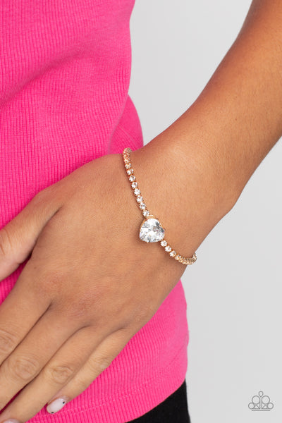 BEDAZZLED BEAUTY - GOLD HEART GEM RHINESTONE BRACELET - PAPARAZZI