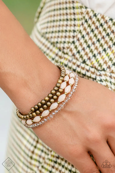 CELESTIAL CHAPTER - BRASS AND PEACH BEAD COIL BRACELET - PAPARAZZI FASHION FIX NOVEMBER 2022