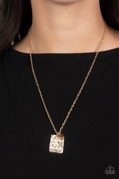 DIVINE DEVOTION - GOLD "HE LOVED US FIRST" PENDANT NECKLACE - PAPARAZZI