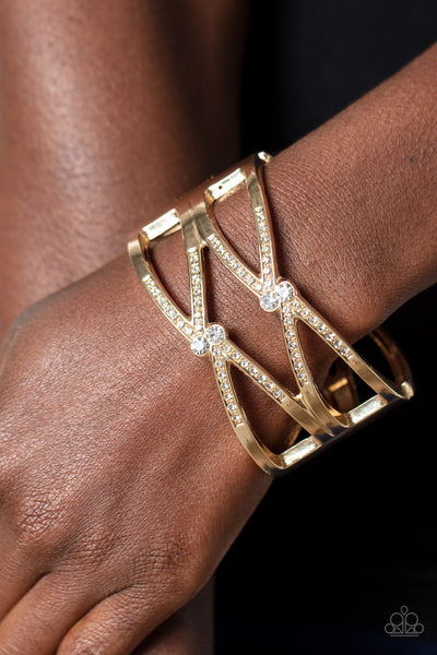 ENTRANCING ETIQUETTE - GOLD WITH RHINESTONE HINGED BRACELET - PAPARAZZI