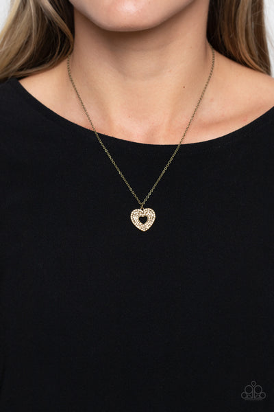 ROMANTIC RETREAT - BRASS HEART TOPAZ RHINESTONE NECKLACE - PAPARAZZI