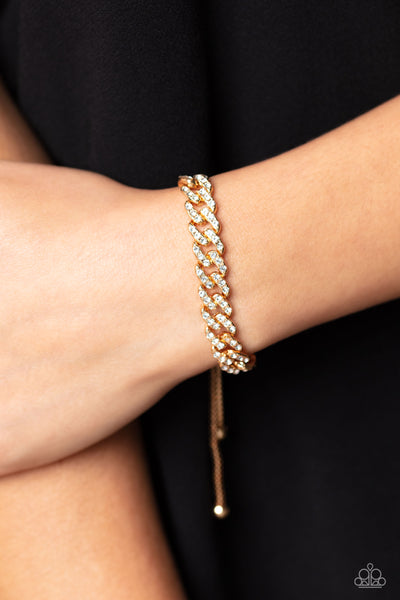 MECCA METRO - GOLD RHINESTONE SLIDE BRACELET - PAPARAZZI