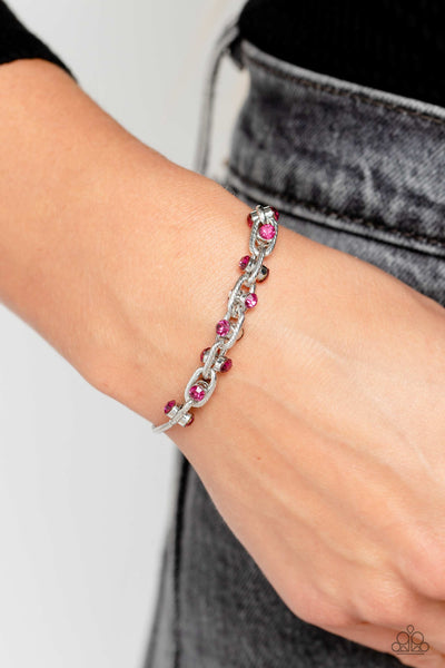 INTERTWINED ILLUSION - PINK RHINESTONE SILVER SLIDE BRACELET - PAPARAZZI