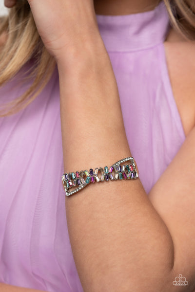 TIMELESS TRIFECTA - MULTI COLOR RHINESTONE SILVER HINGED BRACELET - PAPARAZZI LIFE OF THE PARTY MAY 2023