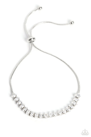 DYNAMIC DIAMONDS - WHITE RHINESTONE SILVER SLIDE BRACELET - PAPARAZZI