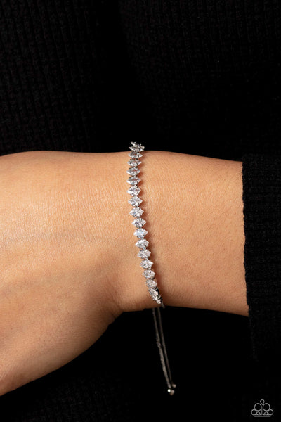 DYNAMIC DIAMONDS - WHITE RHINESTONE SILVER SLIDE BRACELET - PAPARAZZI