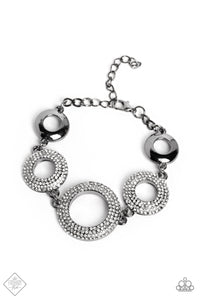 HYPNOTIC HOT SHOT - BLACK GUNMETAL WHITE RHINESTONE CIRCLE BRACELET - PAPARAZZI FASHION FIX FEBRUARY 2023