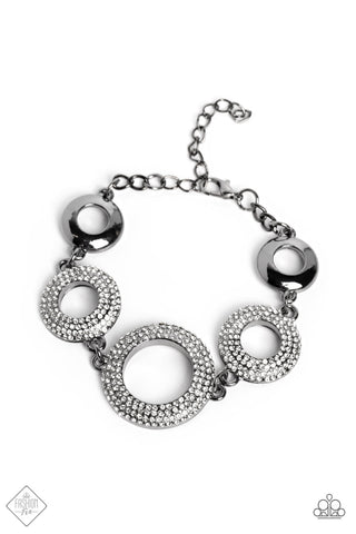 HYPNOTIC HOT SHOT - BLACK GUNMETAL WHITE RHINESTONE CIRCLE BRACELET - PAPARAZZI FASHION FIX FEBRUARY 2023