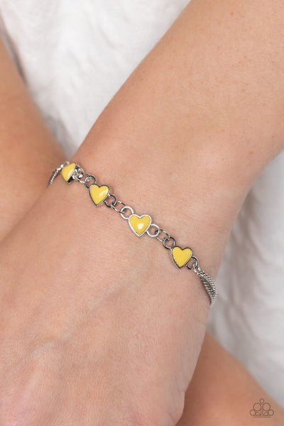 SMITTEN SWEETHEARTS - YELLOW HEART SILVER BRACELET - PAPARAZZI