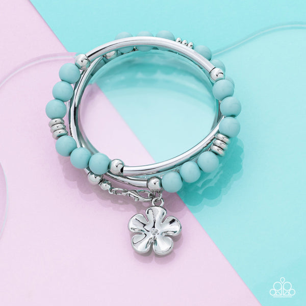 OFF THE WRAP - BLUE BEAD SILVER FLOWER COIL BRACELET - PAPARAZZI