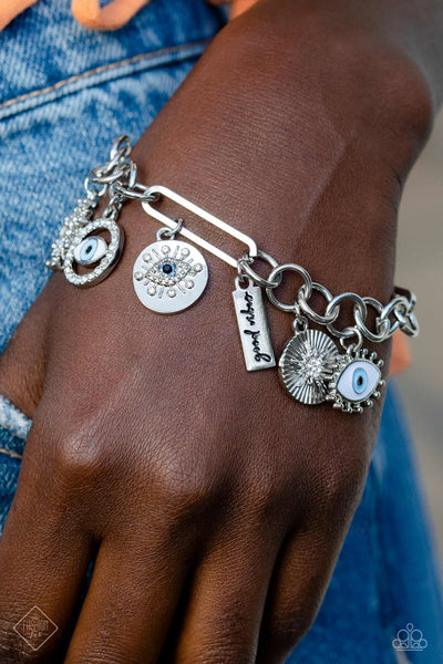 VIBE TO THE RHYTHM - BLUE EEY SILVER CHARM BRACELET - PAPARAZZI - FASHION FIX MARCH 2023