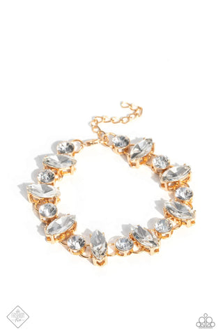 EXCLUSIVELY EXTRAVAGANT - GOLD WITH WHITE RHINESTONE BRACELET - PAPARAZZI - FASHION FIX MARCH 2023