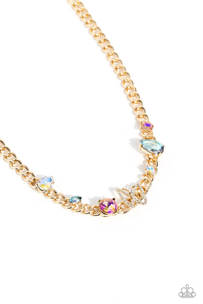 STORYBOOK SUCCESSION - GOLD CHAIN WHITE RHINESTONE BUTTERFLY MULTI COLOR GEM SHORT NECKLACE - PAPARAZZI - LIFE OF THE PARTY SEPTEMBER 2023