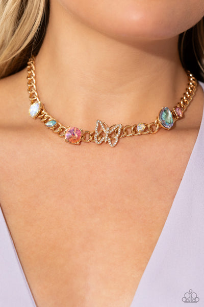 STORYBOOK SUCCESSION - GOLD CHAIN WHITE RHINESTONE BUTTERFLY MULTI COLOR GEM SHORT NECKLACE - PAPARAZZI - LIFE OF THE PARTY SEPTEMBER 2023