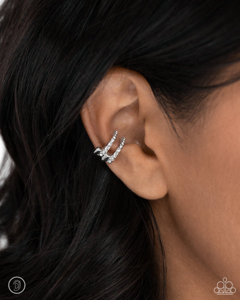 GLITTERY GLOW UP - SILVER EAR CUFF EARRINGS - PAPARAZZI