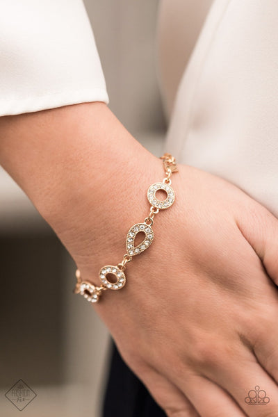 ROYALLY REFINED - GOLD RHINESTONE BRACELET - FASHION FIX EXCLUSIVE APRIL 2021 - PAPARAZZI