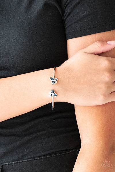 GOING FOR GLITTER - BLUE RHINESTONE SILVER CUFF BRACELET - PAPARAZZI
