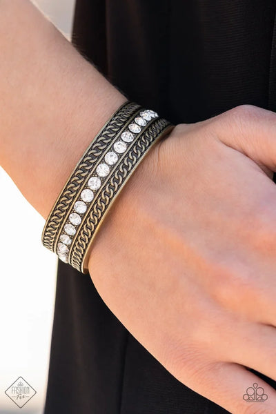 GRIT GOALS - BRASS AND WHITE RHINESTONE CUFF BRACELET - PAPARAZZI FASHION FIX MAY 2022